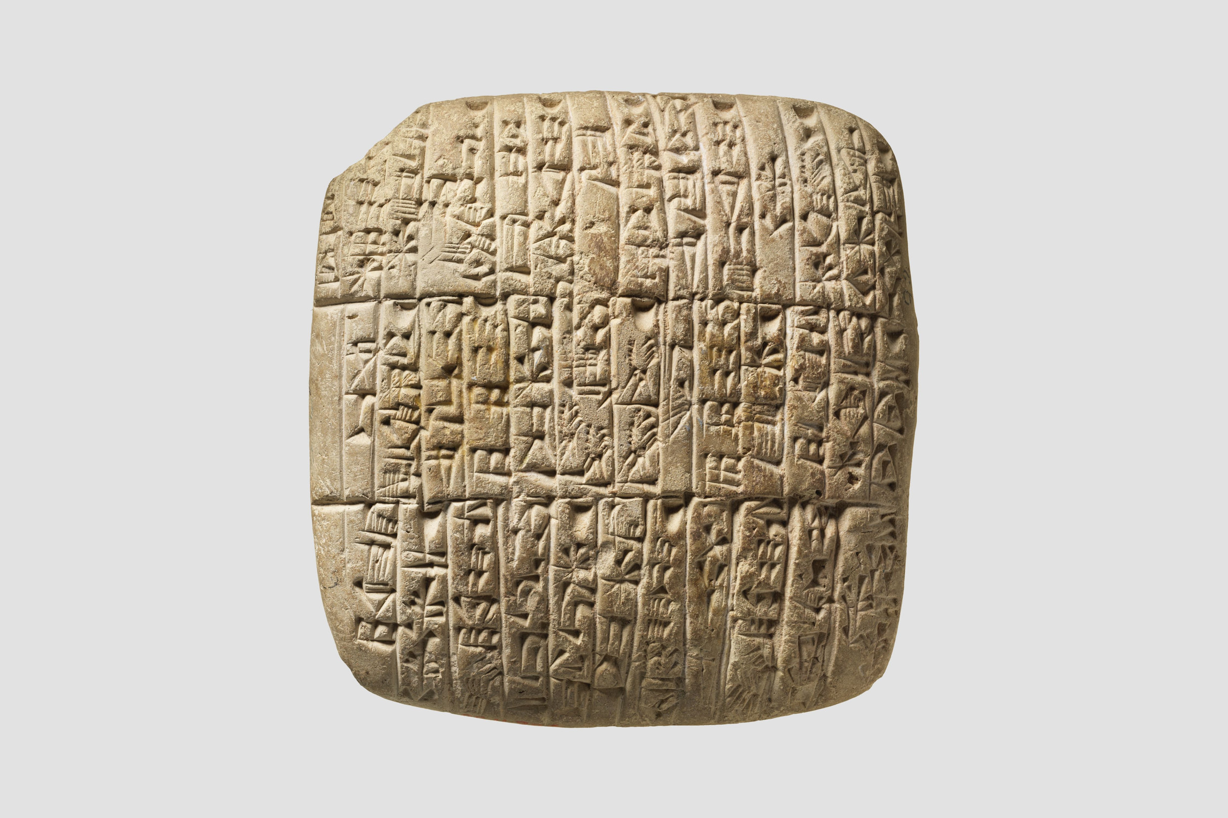 An Akkadian clay tablet recording the sale of a house, c. 2350–2150 BCE